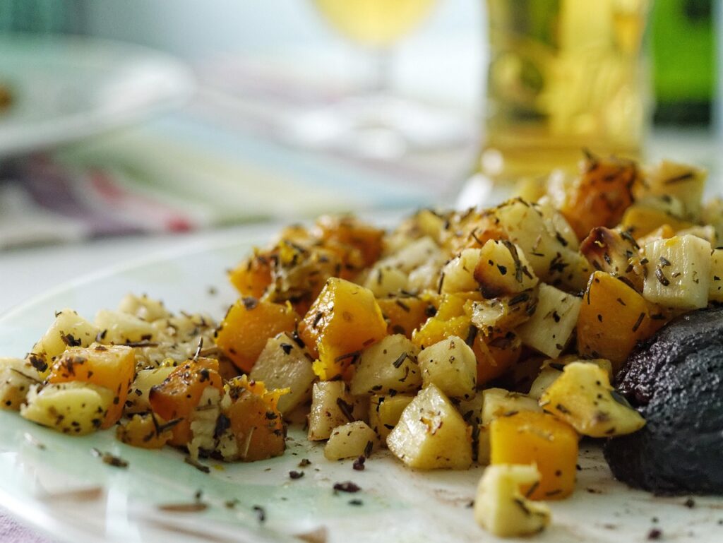 Weight Loss A square-shaped potato slice garnished with colorful spices, displayed on a clean surface. Weight Loss Tips